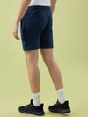 Hint Shorts with sidetapping and side pockets with zippers on both side with self fabic elasticatedwaistband with draw cord