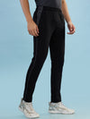 Hint track pant with side panel and piping and side pockets with zippers on both side with self fabric elasticated waistband with draw cord