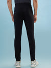 Hint track pant with side panel and piping and side pockets with zippers on both side with self fabric elasticated waistband with draw cord
