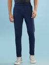 Hint track pant with side panel and piping and side pockets with zippers on both side with self fabric elasticated waistband with draw cord