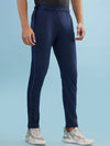 Hint track pant with side panel and piping and side pockets with zippers on both side with self fabric elasticated waistband with draw cord