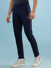 Hint track pant with side panel and piping and side pockets with zippers on both side with self fabric elasticated waistband with draw cord