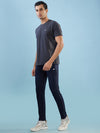 Hint track pant with side panel and piping and side pockets with zippers on both side with self fabric elasticated waistband with draw cord