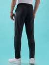 Hint Track pant with side tapping and side pockets with zippers on both side with self fabric elasticatedwaistband with draw cord