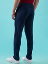Hint Track pant with side tapping and side pockets with zippers on both side with self fabric elasticatedwaistband with draw cord